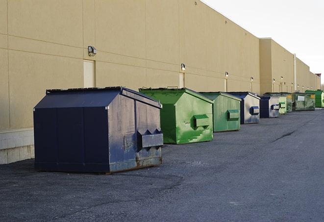 heavy-duty construction dumpsters on a job site in Hobbs NM